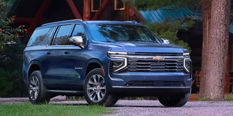 Chevrolet Suburban Blue in garden