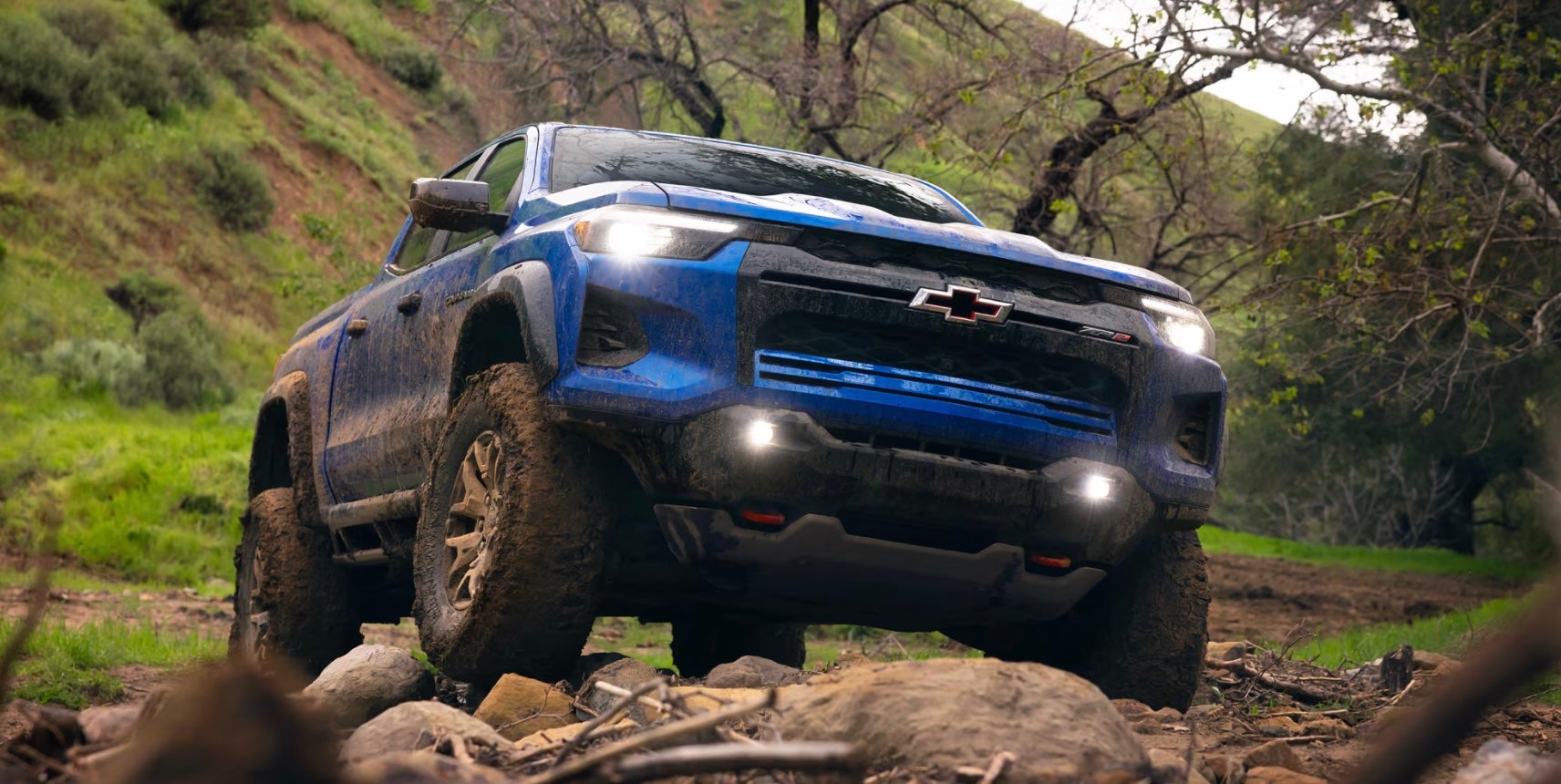 Blue 2026 Chevy Colorado climbing hill - Weatherford, TX